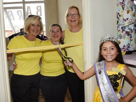 Lilly-Anne Johnson, nine, Junior Miss North West Beauty, officially opens the Daffodils Dreams boutique, pictured with members of the charity, from left, Noreen Bond, Lydia Helsby and Maureen Holcroft