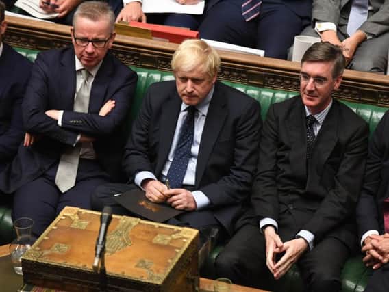 Boris Johnson and key supporters Michael Gove and Jacob Rees-Mogg during Wednesday night's Commons debate