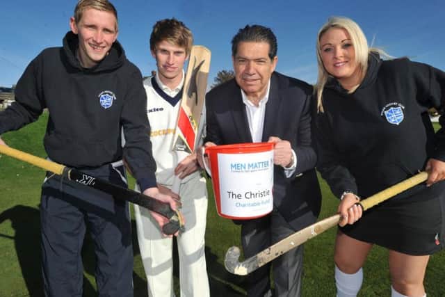 Bernard with players from Wigan hockey and cricket clubs supporting Men Matters