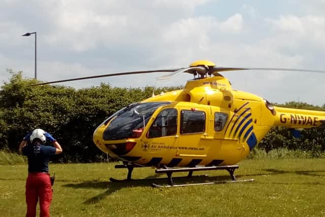 Mum Angela captured the moment the air ambulance landed to airlift Joshua to hospital