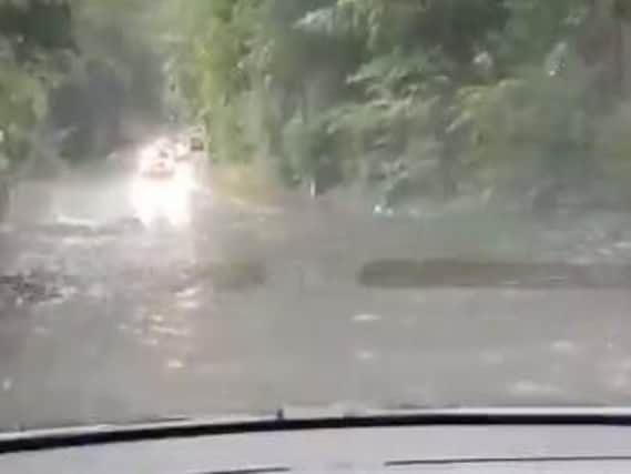 The flooding on Gathurst Lane