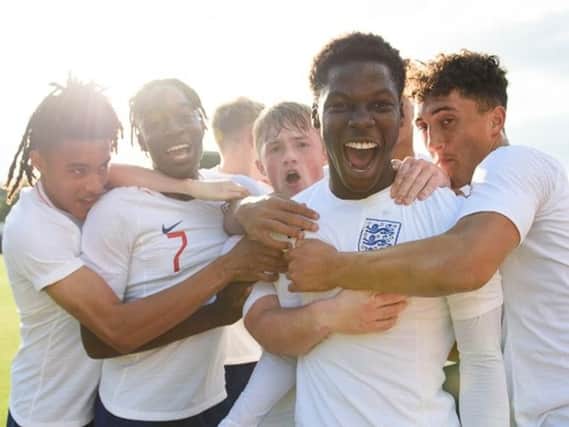 Joe Gelhardt celebrates with his England team-mates (Pic: The FA)
