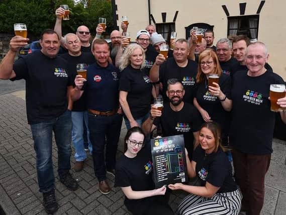 Members of Wigan CAMRA are organising a 11-day celebration of music, art, food and beer, to coincide with National Cask Ale Week, pictured at the launch at The Royal Oak pub