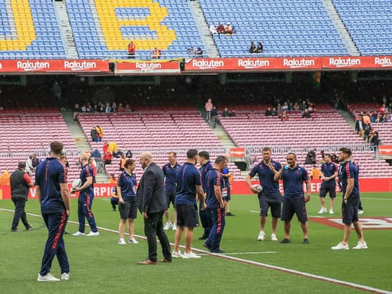 Wigan players step foot on the Camp Nou pitch