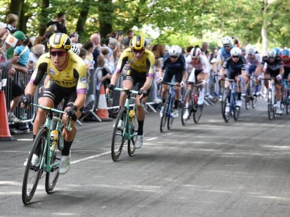 The Tour of Britain peloton speeding through Haigh