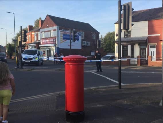 Bickershaw Lane is taped off by police after the latest shooting