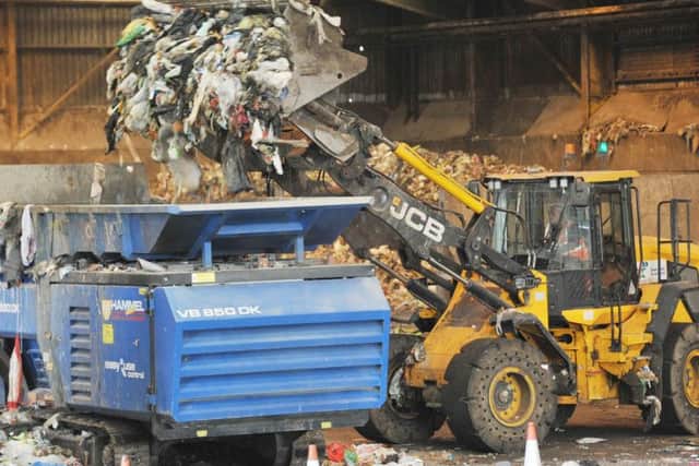Some of the huge machinery in action at the recycling centre
