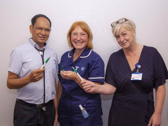 Staff at the borough's hospital Trust are urging Wiganers to get flu jabs
