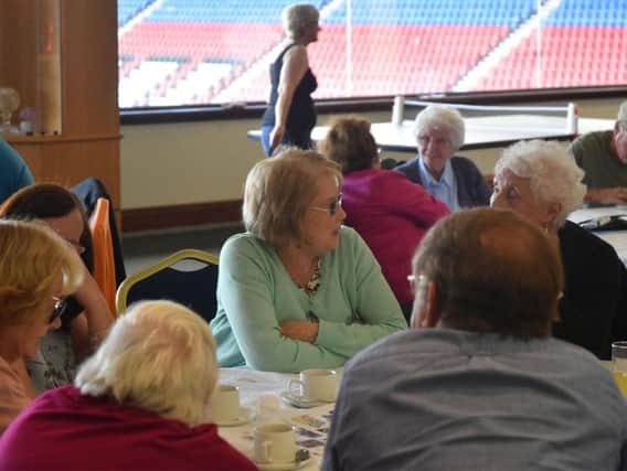 Bernie Green enjoys a chat with friends she has made at the Extra Time hub