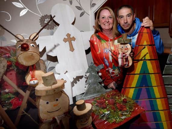 Janice and Justin with some of their decorations