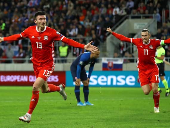 Kieffer Moore celebrates scoring his first goal for Wales in Slovakia