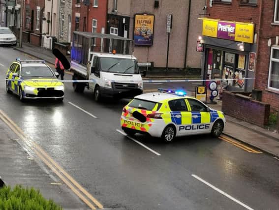 Police seal off Atherton Road, Hindley, after the early morning crash. Picture by Chellsi McGarry