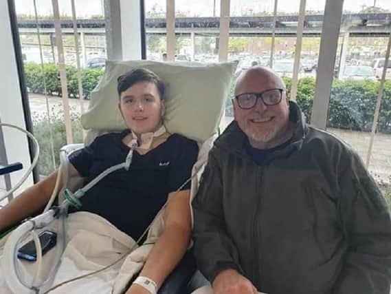 Harvey in hospital with his dad Phil
