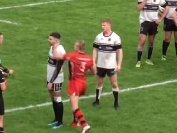 Callum Jones of Langworthy Reds (pictured wearing the No.3 jersey) has been banned for life after sucker punching a Chorley Panthers player. (Photo: YouTube/terrygorman2000)