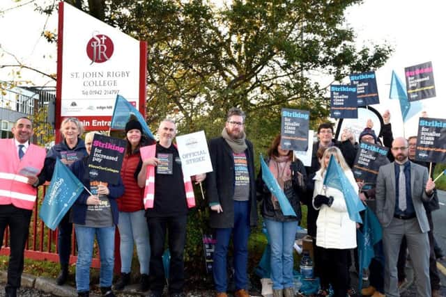 Staff at St John Rigby College, Orrell, joined by supporters and members of the National Education Union in a strike over poor pay in sixth form colleges.