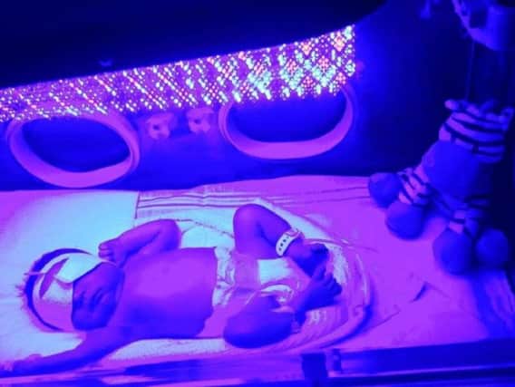 Jackson in an incubator when he was just a few days old