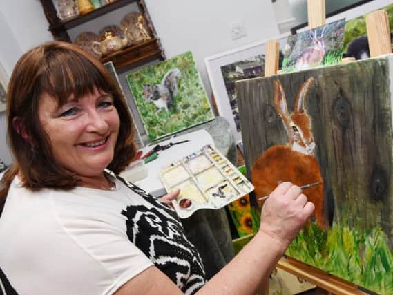 Self-taught artist Sadie Jones from Billinge, with some of her work, she was selected to take part in Sky Arts Landscape Artist of the Year TV show.