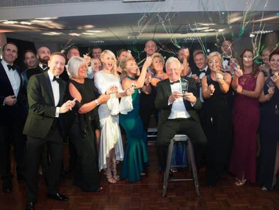 Martin Ainscough surrounded by friends and family after receiving his Lifetime  Achievement award