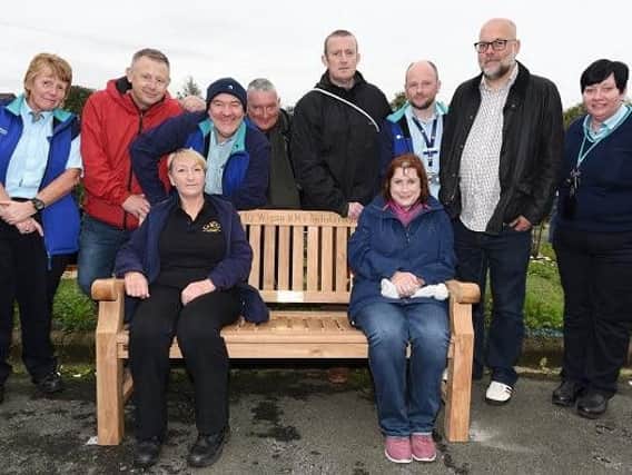 The unveiling of the memorial bench to John Mitchinson at Wigan Wallgate station, following a fund-raising effort by his former colleagues in the rail industry and in the RMT union
