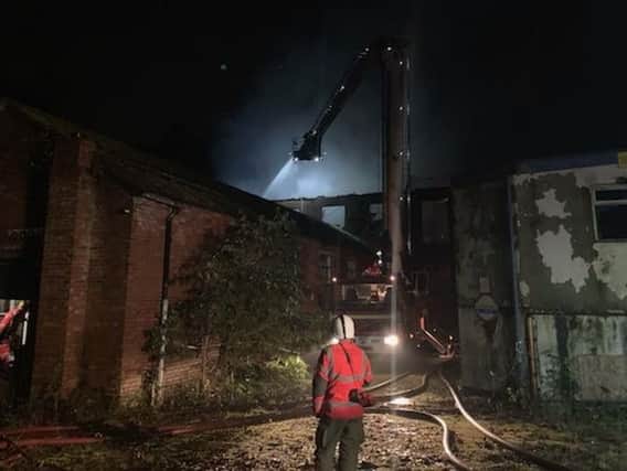 Fire crews at the scene in Leyland Mill Lane. Image: GMFRS