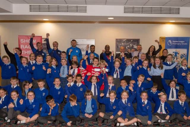 Wigan pupils give racism the red card