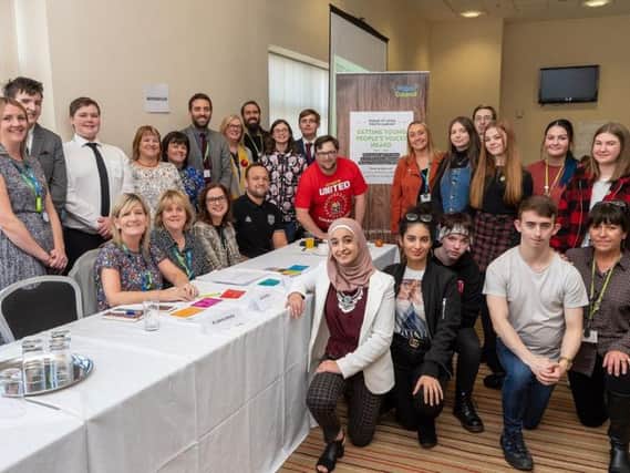 Coun Jenny Bullen and Coun Susan Gambles with staff from Wigan Council, GP Dr Jayne Davies and representatives from Wigan Borough CCG and North West Boroughs NHS Trust, and young people from Wigan and Leigh Youth Cabinet at the Mental Health and Me Event