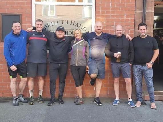Ben Abbott (third from the right) with family and friends before the bike ride