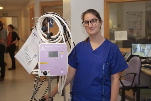 Staff nurse Elsa Martins, with the new CPAP machine