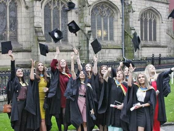 Graduands received their cap and gowns at the college before the traditional procession up Market Street