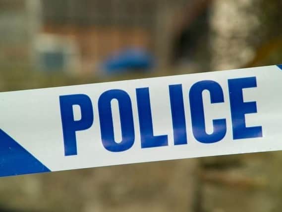 Police have shut Wigan Road