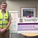 Bob Duff presents the cheque to Christine Edwardson