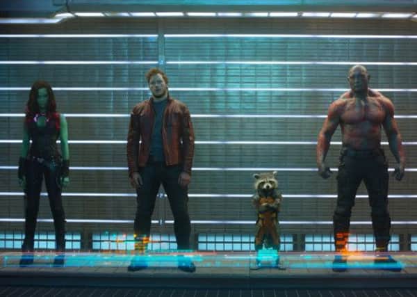Gamora (Zoe Saldana), Peter Quill/Star-Lord (Chris Pratt), Rocket Raccoon (voiced by Bradley Cooper) and Drax The Destroyer (Dave Bautista)