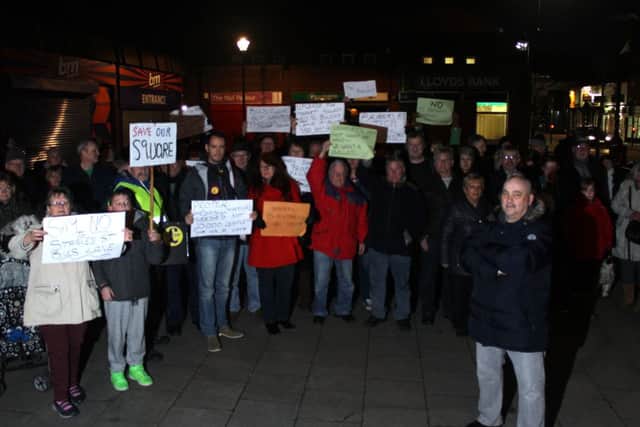 Tyldesley Shopkeepers are angry about the guided busway plans along the Market Square. Pictured is Ian Williams campaign leader with the protestors on the Market Square