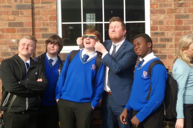 Pupils at the Deanery taking in the eclipse