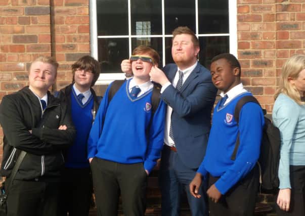 Pupils at the Deanery taking in the eclipse