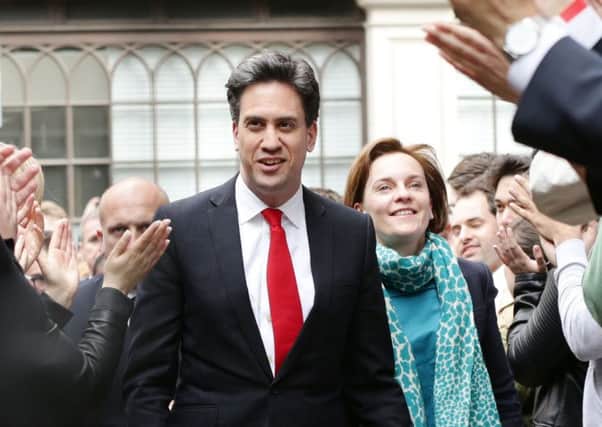 Labour leader Ed Miliband arrives with his wife Justine at the Labour party central office in Brewer's Green, London after travelling down from his Doncaster constituency, as according to reports he is expected to resign following sweeping losses in Scotland and with David Cameron close to an overall majority