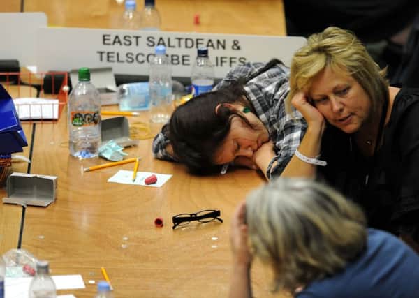 A vote counter lays on a table during a break in counting for the Hove, Brighton Pavilion and Brighton Kemptown constituencies for the General Election at the Brighton Centre in Brighton