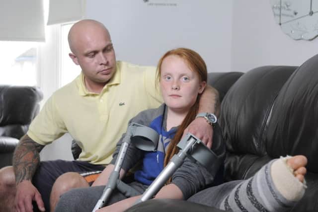 Emmalee with dad Chris McCormick recovering at home