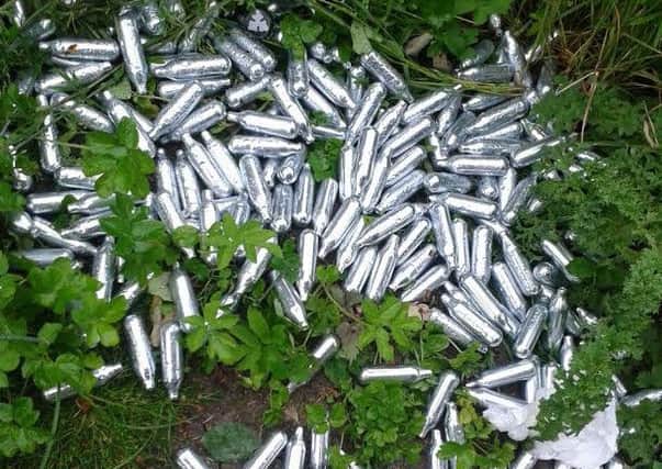 Dumped nitrous oxide canisters
