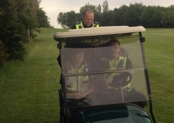 Police officers used a golf buggy to investigate reports of a tent being pitched on the golf course at Heron's Reach.