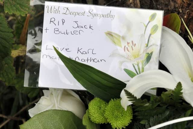 Tributes: Flowers at the scene of the crash