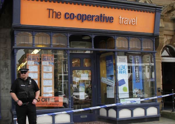 Police at the Co-operative Travel store in St Annes
