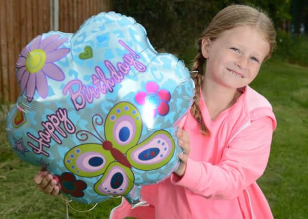 A  balloon travelled 900 miles after eight-year-old Lillie-May let go of it in her back garden in Burnley. 

Thomas Temple/rossparry.co.uk