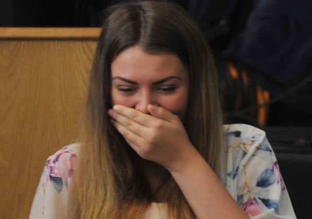 A student is happy to get her results at Byrchall High School, Ashton-in-Makerfield