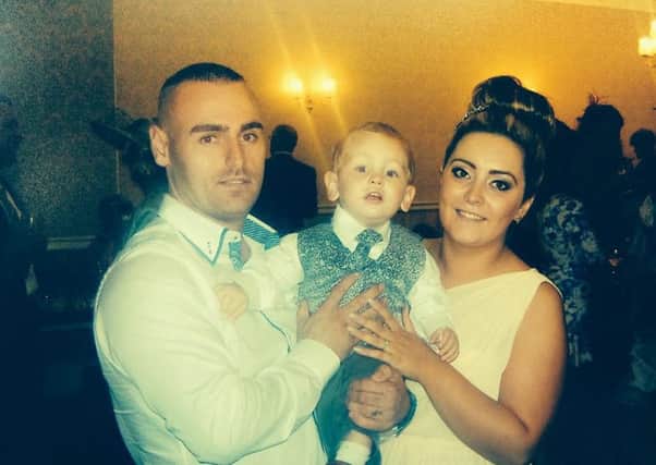 Jacob Jenkins pictured with parents Abigail Wilson and David Jenkins
