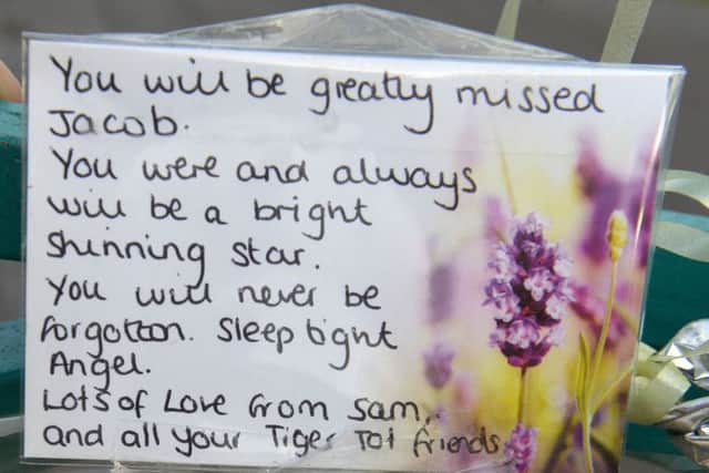 A message left on flowers at Seaton Carew in memory of Jacob Jenkins. Picture by FRANK REID