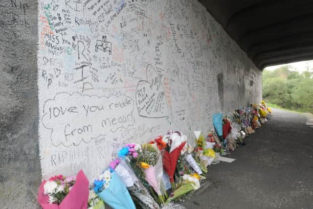 Floral tributes for Robbie Williamson (11) who died after falling off the canal bridge on Lowerhouse Lane.