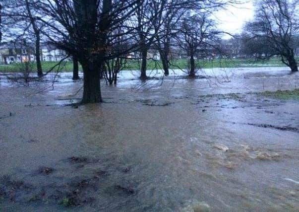 Flooded parks like this one in Burnley have become a familiar sight