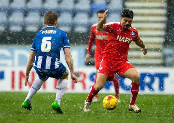 Sam Morsy in action for Chesterfield against Wigan Athletic, on January 16