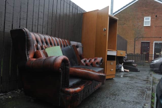 Furniture dumped outside houses off Botany Close, New Springs